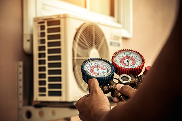 Professional Hvac technician working in Decatur, IL